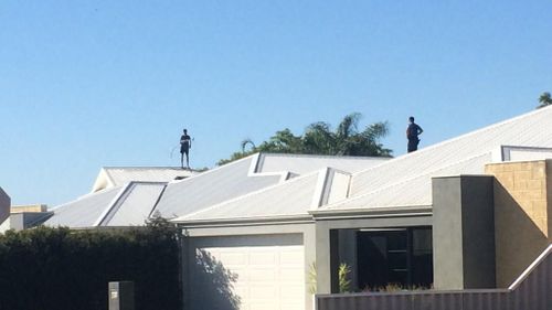 Perth police end rooftop stand-off with alleged thief