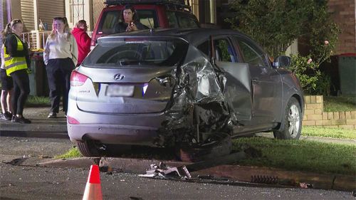 Car crashes into side of Guildford home where woman was sleeping.