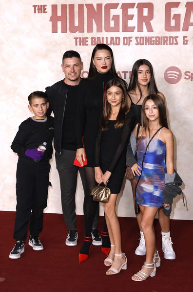 HOLLYWOOD, CALIFORNIA - NOVEMBER 13: Andre Lemmers, Adriana Lima and family attend "The Hunger Games: The Ballad of Songbirds & Snakes" Los Angeles Premiere at TCL Chinese Theatre on November 13, 2023 in Hollywood, California. (Photo by Frazer Harrison/Getty Images)