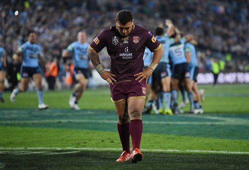 Greg Inglis trudges off the field having lost to NSW during his first series as captain. Picture: AAP