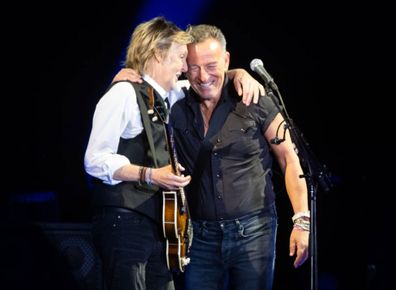 Paul McCartney performs with Bruce Springsteen