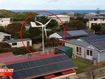 Neighbourhood dispute erupts over man's backyard wind turbine 