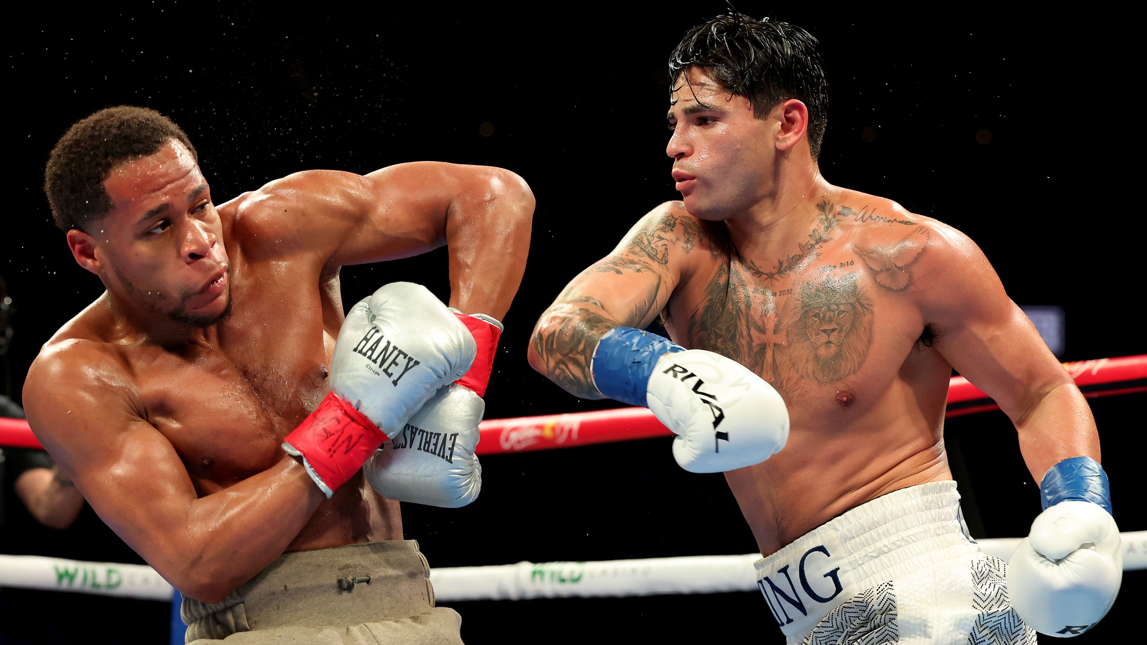 Ryan Garcia throws a punch at Devin Haney.