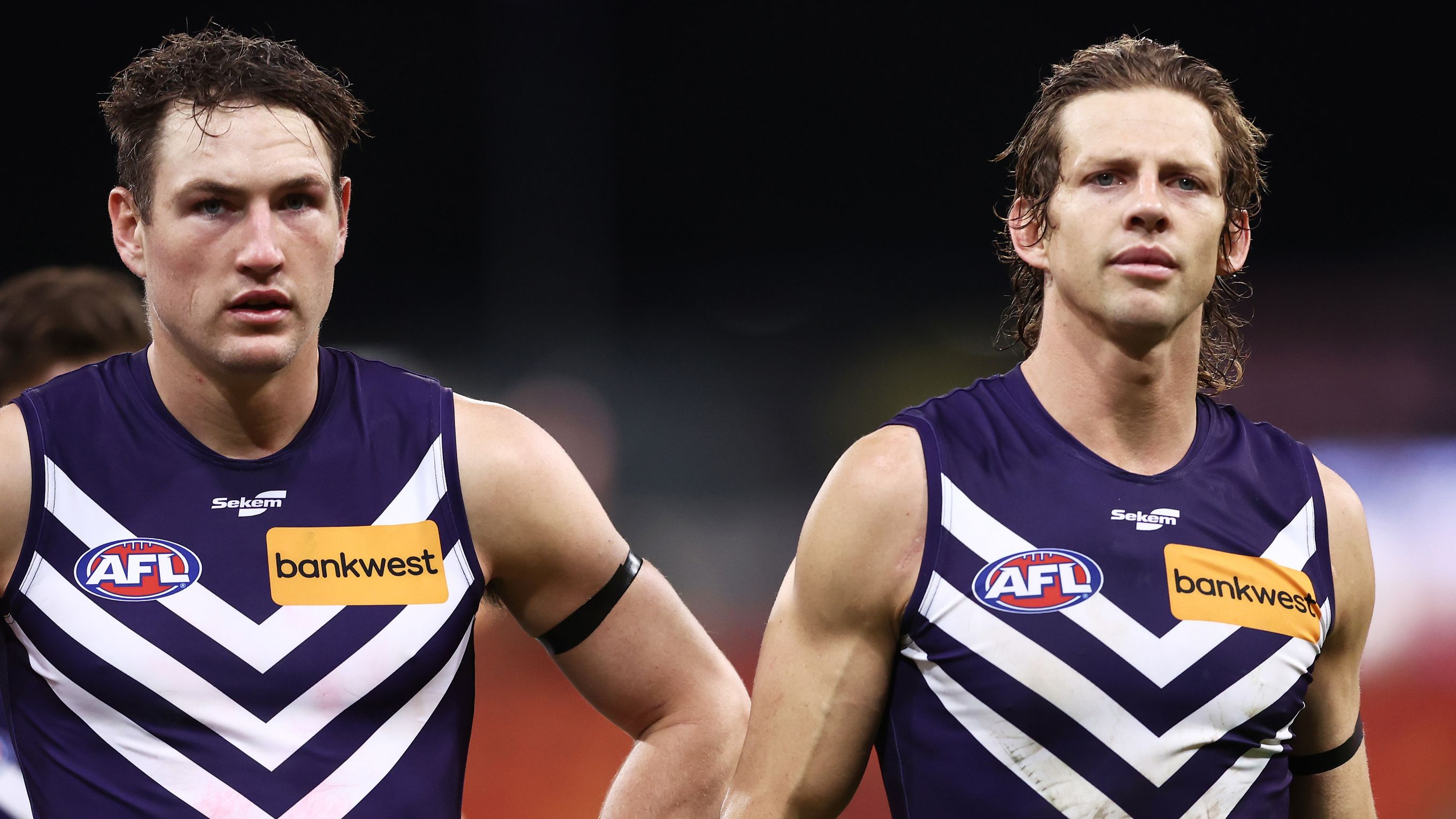 SYDNEY, AUSTRALIA - JUNE 17: Nat Fyfe of the Dockers and team mates look dejected after the round 14 AFL match between Greater Western Sydney Giants and Fremantle Dockers at GIANTS Stadium, on June 17, 2023, in Sydney, Australia. (Photo by Matt King/AFL Photos/via Getty Images )