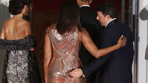 Italian PM's hand of friendship to Michelle Obama