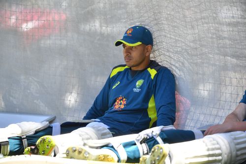 Usman Khawaja takes a moment out in the nets today ahead of Thursday's opening Test against India in Adelaide.