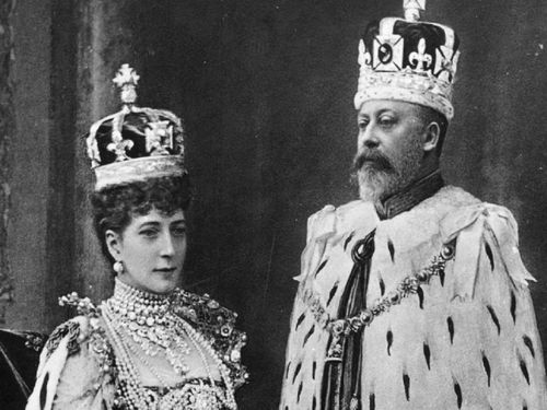 1902:  British monarchs Queen Alexandra, (1844 - 1925), and King Edward VII, (1841 - 1910), who married in 1863, at their coronation in London.  (Photo by Hulton Archive/Getty Images)
