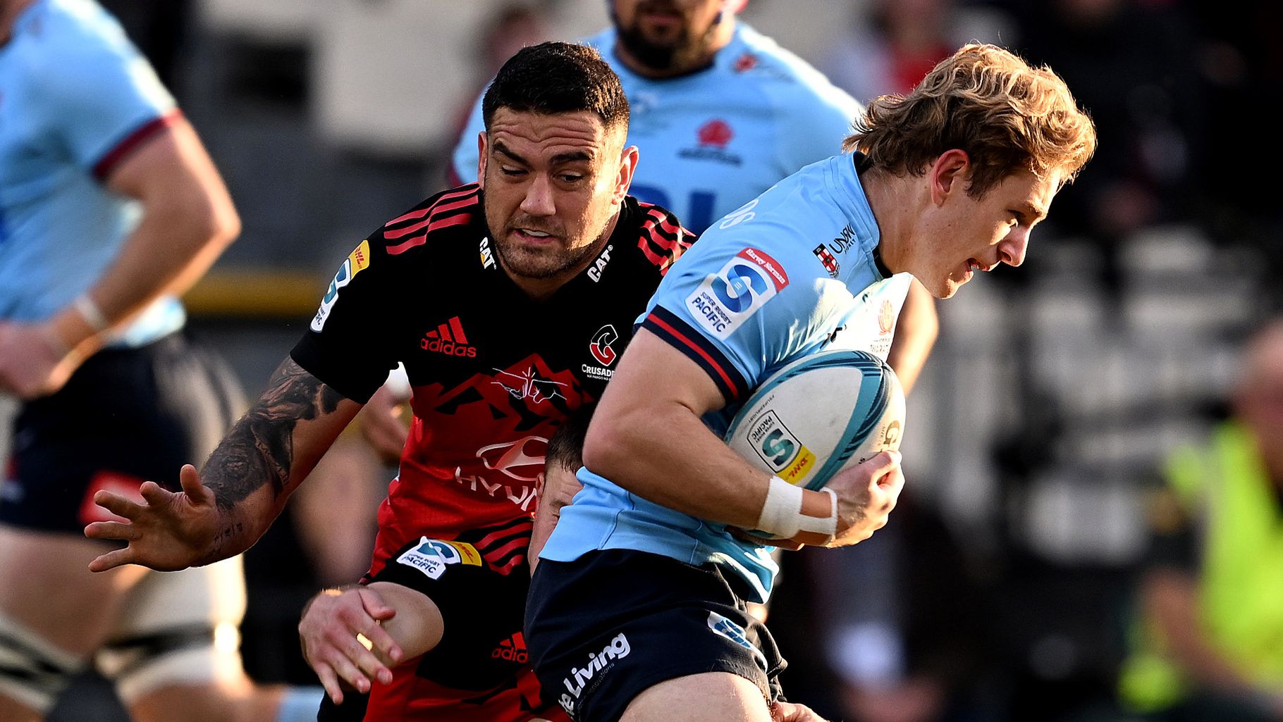 Max Jorgensen charges forward during the round 14 Super Rugby Pacific match between Crusaders and NSW Waratahs.