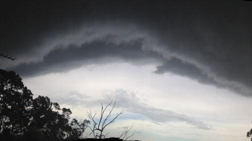 Dark storm clouds over houses in Linden, NSW. (Peter Richards)
