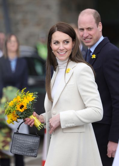 Catherine, Princess of Wales and Prince William, Prince of Wales smile as they depart Aberavon Leisure & Fitness Centre during their visit to Wales on February 28, 2023 in Port Talbot, Wales.