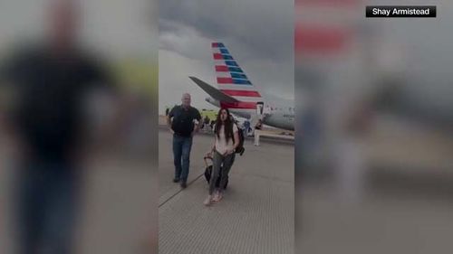 those on board were evacuated on the runway, according to American Airlines and Denver International Airport.