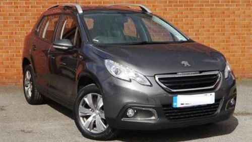 A Peugeot wagon similar to the car the Tromps drove on their technology-free road trip.