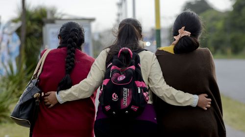 Relatives embraced after the announcement on Thursday at the submarine's home naval base. (AAP)