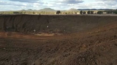 The empty dam on a property owned by mum and farmer Jess Taylor. Picture: 9NEWS