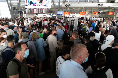 Crowds at Sydney Airport bottleneck at security.