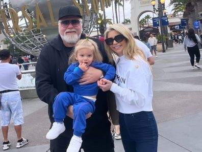 Kyle Sandilands, Tegan Kynaston and son Otto in the US