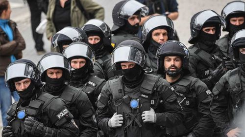 Police during a protest in Chemnitz, Germany.