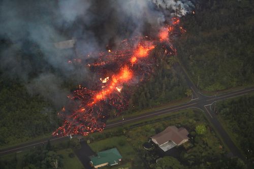 A 2000-foot long fissure erupts within the Leilani Estates subdivision. (AAP)