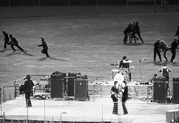 Where did the Beatles perform their final paid concert?