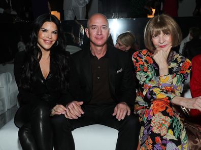 Lauren Sanchez, Jeff Bezos and Anna Wintour in the front row (Photo by John Salangsang/WWD/Penske Media via Getty Images)