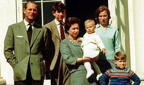 The Queen holds a baby Prince Edward. Her husband Prince Philip, far left, broke royal tradition by attending his son's birth in 1964. (Photo: PA Wire).