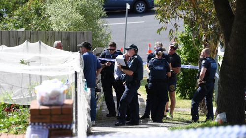 Police remain at the scene of the balcony collapse. (AAP)