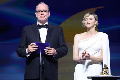 Albert II, Prince of Monaco and Charlene, Princess of Monaco on stage speaking at the closing ceremony during the 63rd Monte-Carlo Television Festival