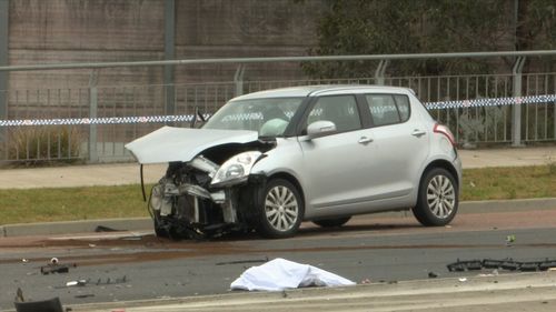 A woman was trapped in the Suzuki Swift before being taken to Liverpool Hospital for treatment.