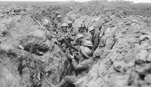 Australian infantry take a break from the assault on the French village of Bullecourt in 1917. (Photo: Australian War Memorial).