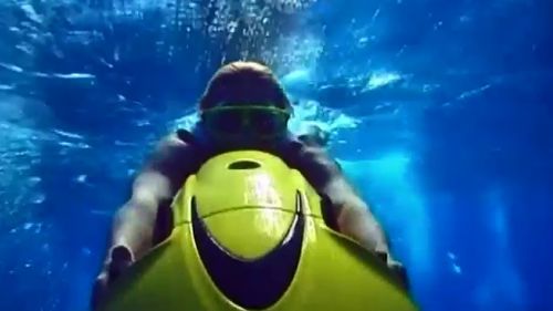 The SeaBob motorised scooter can dive underwater. (Supplied)