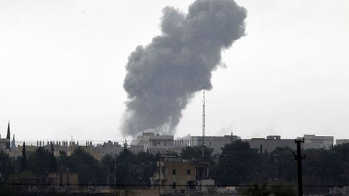 Smoke billows following an airstrike by US-led coalition aircraft in Kobani, Syria. (Getty Images)