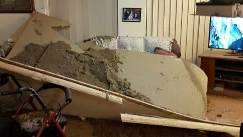 The ceiling collapsed on the couple as they were watching the news. (9NEWS)