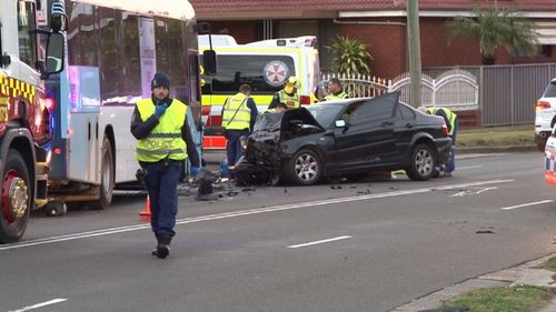 The driver of the black sedan died at the scene. Image: 9News