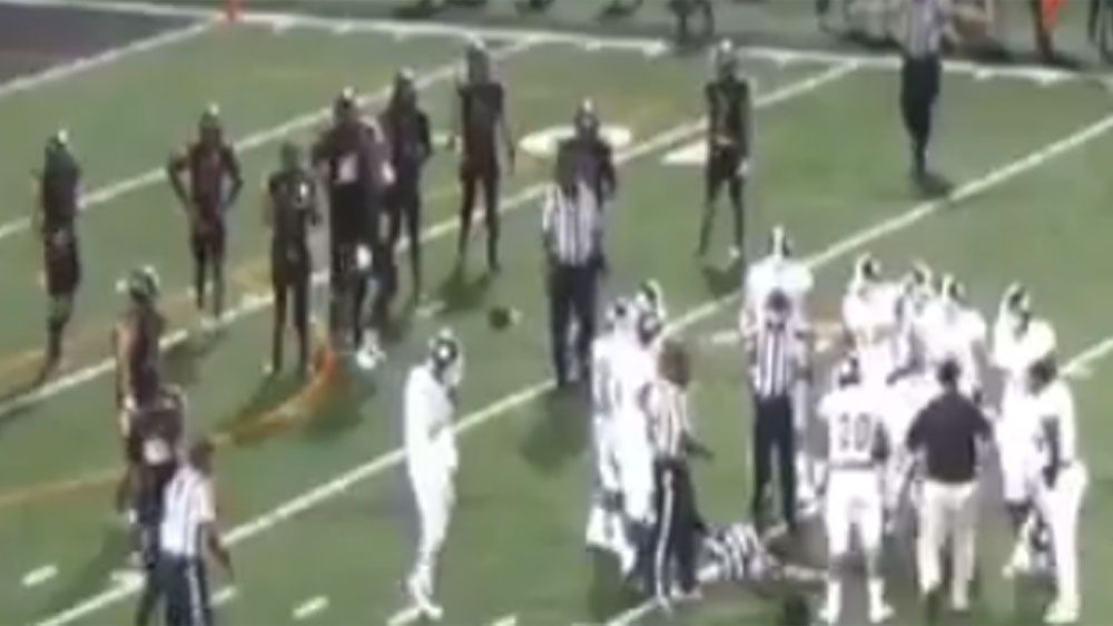 College football player punches referee