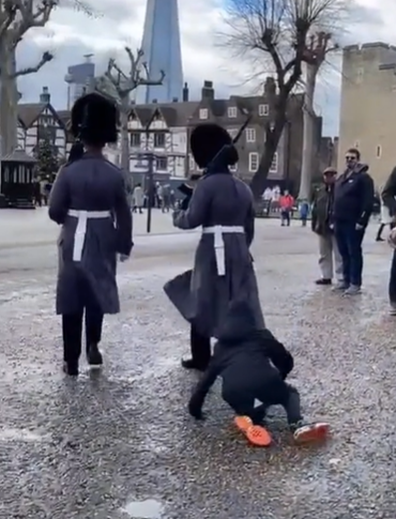 Queen's Guard knocks over young boy in shocking video