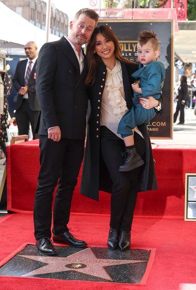 HOLLYWOOD, CALIFORNIA - DECEMBER 01: (L-R) Macaulay Culkin, Brenda Song and Dakota Song Culkin attend the ceremony honoring Macaulay Culkin with a Star on the Hollywood Walk of Fame on December 01, 2023 in Hollywood, California. (Photo by Amy Sussman/Getty Images)