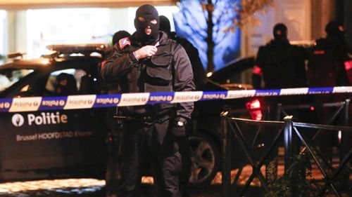 Belgian police arrest 16 people in raids but fugitive terrorist Salah Abdeslam remains on the run
