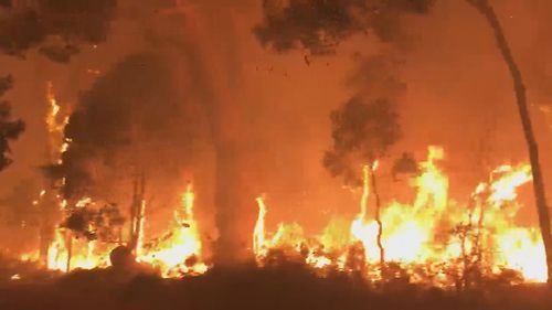 An out-of-control bushfire forced residents in parts of Western Australia's south-west to evacuate last night.