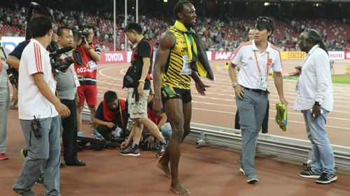 Bolt was uninjured in the accident, and continued his victory lap. (AAP)