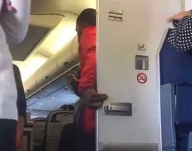 Man emerges from plane bathroom, joins mile high club