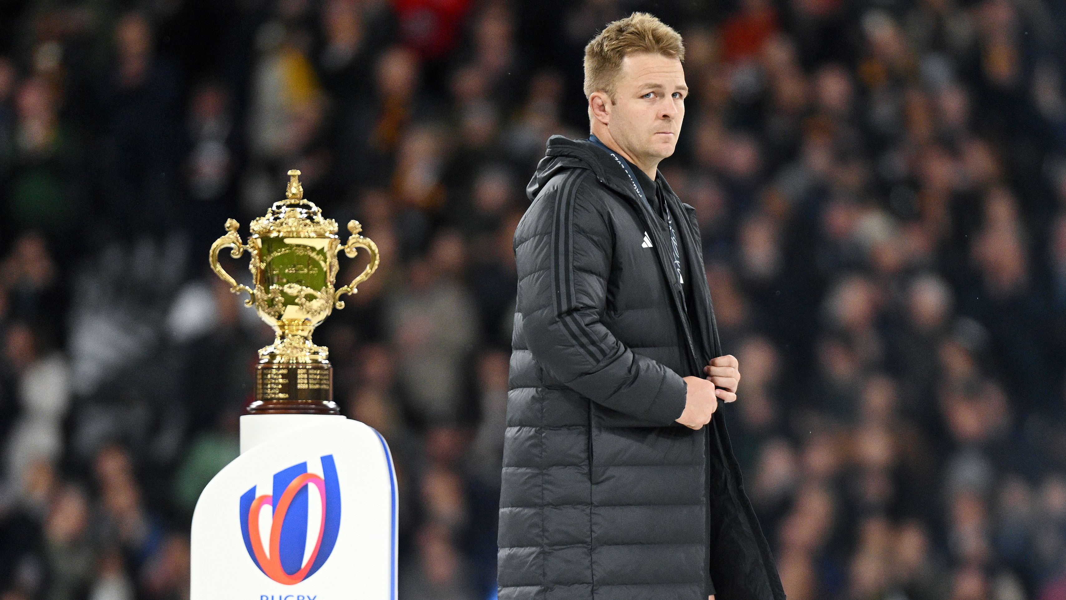 Sam Cane of New Zealand looks on as he walks past the Rugby World Cup.