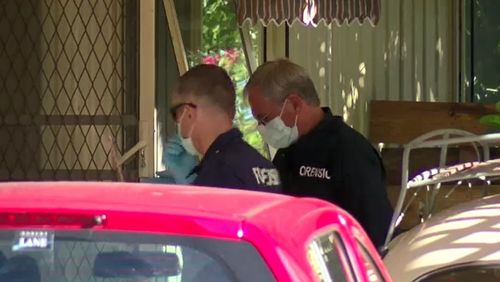 Forensic detectives comb the Mornington Peninsula property. (9NEWS)