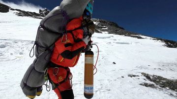 Ngima Tashi Sherpa carries a Malaysian climber from the death zone at Mount Everest on May 18, 2023.Ngima Tashi Sherpa carries a Malaysian climber from the death zone at Mount Everest on May 18, 2023.