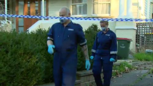 Detectives scouring the scene this afternoon. (9NEWS)