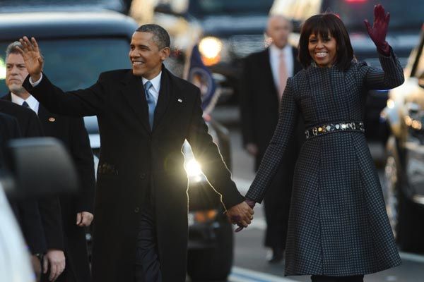 The Obamas celebrate after the president's swearing in. (Getty)