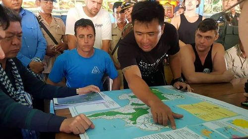 Officers show a map of Koh Rong where British national Amelia Bambridge went missing.