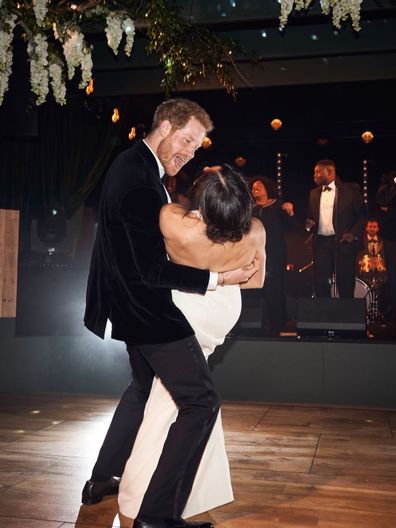 Meghan, Duchess of Sussex, with Prince Harry, Duke of Sussex, during their evening wedding reception at Frogmore House on May 19, 2018 in Windsor.