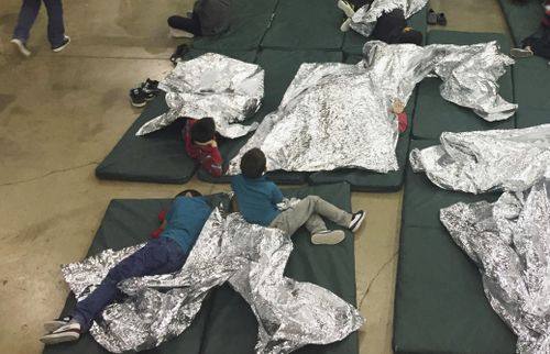 These people are being detained in McAllen in Texas. Picture: AAP