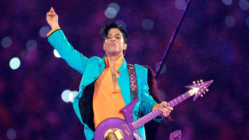 Prince performs during the halftime show at the Super Bowl XLI football game in Miami in 2007. (AP)