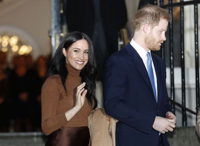 FILE - In this Tuesday, Jan. 7, 2020 file photo, Britain's Prince Harry and Meghan, Duchess of Sussex smile as they leave Canada House, in London. Prince Harry and his wife Meghan 'stepping back' as senior UK royals, will work to become financially independent, they announced Wednesday, Jan. 8, 2020.(Daniel Leal-Olivas/Pool Photo via AP, file)